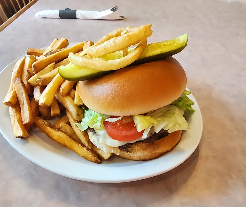 French Onion Burger — Certified Angus Beef burger with Swiss cheese and French onion soup onions at Big Guy's Ranch & Saloon, Winnipeg