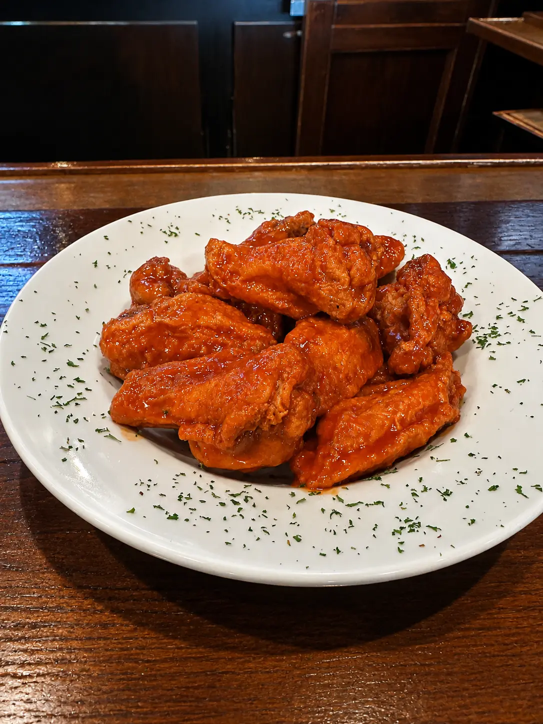 Chicken Wings tossed in house hot sauce at Big Guy's Ranch & Saloon, St. Vital, Winnipeg